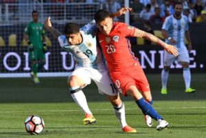 argentina-forward-ever-banega-l-competes-for-the-ball-against-chiles-charles-aranguiz