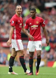 MANCHESTER, ENGLAND - SEPTEMBER 24: Zlatan Ibrahimovic and Marcus Rashford of Manchester United during the Premier League match between Manchester United and Leicester City at Old Trafford on September 24, 2016 in Manchester, England. (Photo by James Baylis - AMA/Getty Images)