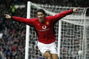 MANCHESTER, ENGLAND - DECEMBER 13: Ruud van Nistelrooy of Man Utd celebrates after scoring the second goal during the FA Barclaycard Premiership match between Manchester United and Manchester City at Old Trafford on December 13, 2003 in Manchester, England. (Photo by Alex Livesey/Getty Images)
