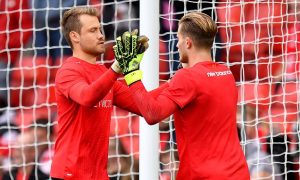Liverpool goalkeeper Loris Karius (right) with Simon Mignolet (left) before the Premier League match at Anfield, Liverpool.